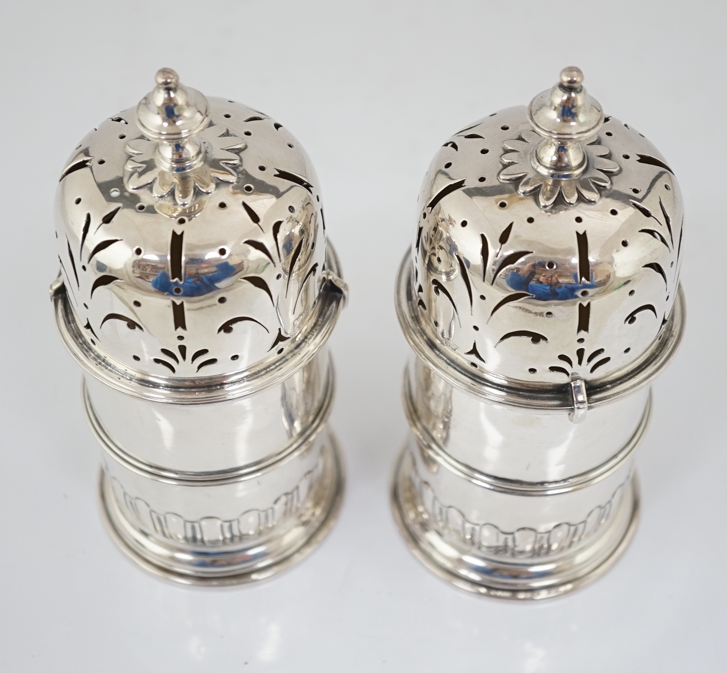 A good pair of late George I silver lighthouse casters, by William Spackman